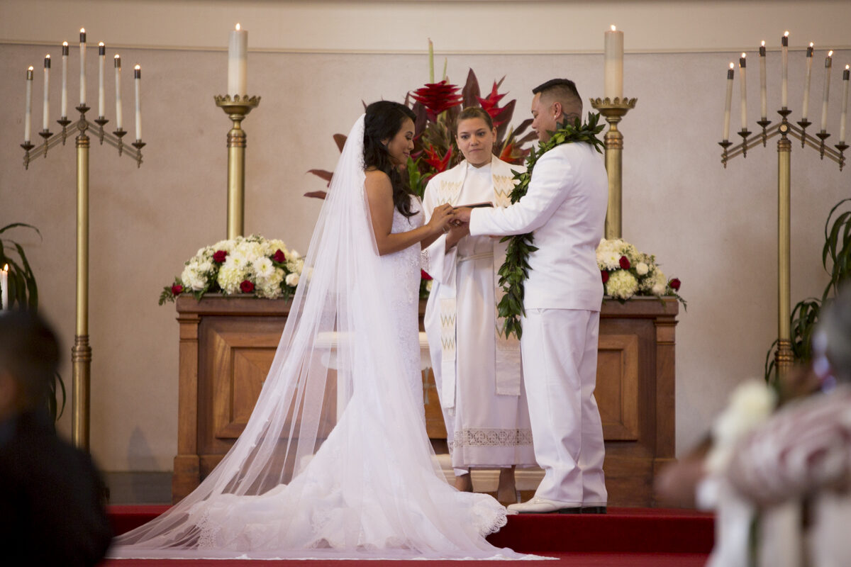 Ring exchange during a Hawaii wedding ceremony, photographed by Pure Media Hawaii